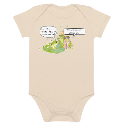 White baby bodysuit with a funny frog-themed design