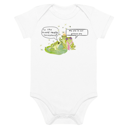 White baby bodysuit with a funny frog-themed design